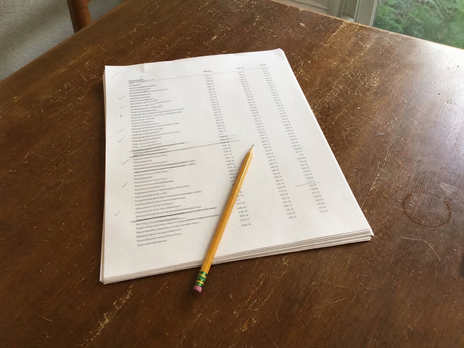 A funeral home General Price List on a wooden table
